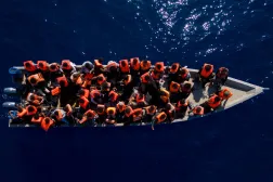 FILE - Migrants sail a wooden boat before being assisted by aid workers of the Spanish NGO Open Arms, in the Mediterranean sea, about 30 miles north of Libya, Saturday, June 17, 2023. (AP Photo/Joan Mateu Parra, File)