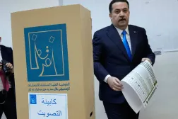 Iraqi Prime Minister Mohammed Shia al-Sudani holds a ballot paper to cast his vote in the parliamentary elections at a polling station in Baghdad, Iraq, 11 November 2025. EPA/CEERWAN AZIZ
