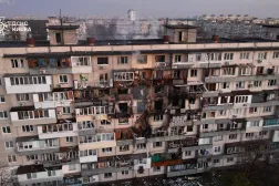 This handout photograph taken and released by the Ukrainian Emergency Service on November 14, 2025, shows a damaged residential building following an air strike in Kyiv, amid the Russian invasion of Ukraine. (Handout / Ukrainian Emergency Service / AFP) 