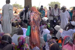FILE PHOTO: Displaced Sudanese gather after fleeing El-Fasher city in Darfur, in Tawila, Sudan, October 29, 2025, in this still image taken from a Reuters' video. REUTERS/Mohamed Jamal/File Photo