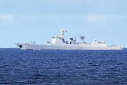 A Chinese PLA navy ship monitors an area during a maritime cooperative activity between the Philippines, Australia and Canadian navy near Scarborough Shoal in the disputed South China Sea on Sep 3, 2025. (AFP) 