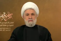 Hizbullah Genel Sekreteri Naim Kasım, "Kudüs yolunda şehit olan âlimler ve yiğitlerin anısına" düzenlenen törende konuşuyor (Ulusal Haber Ajansı)