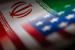 Iran's and US' flags are seen printed on paper in this illustration taken January 27, 2022. REUTERS/Dado Ruvic/Illustration/File Photo
