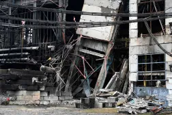 This photograph taken on December 10, 2025 shows the building of a power plant of Ukrainian energy provider DTEK, which was heavily damaged during air attacks, at an undisclosed location, amid the Russian invasion of Ukraine. (AFP)
