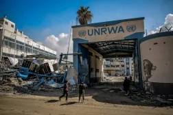 FILED - 10 February 2024, Palestinian Territories, Gaza City: Palestinians examine the damage in front of the United Nations Relief and Works Agency for Palestine Refugees (UNRWA) buildings in Gaza City. Photo: Omar Ishaq/dpa