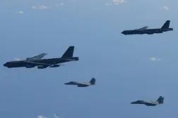 The 6th Air Wing of Japan Air Self-Defense Force's F-15 fighters hold a joint military drill with the US B-52 bombers over Sea of Japan, in this handout picture taken by Japan Air Self-Defense Force and on December 10, 2025, and released by the Joint Staff Office of the Defense Ministry of Japan on December 11, 2025. Joint Staff Office of the Defense Ministry of Japan/Handout via REUTERS     