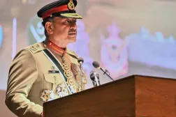 In this photo released by the Inter Services Public Relations, Pakistan's Chief of Defense Forces and Army Chief Gen. Asim Munir speaks during a ceremony at the joint military command headquarters in Rawalpindi, Pakistan, Monday, Dec. 8, 2025. (Inter Services Public Relations via AP)