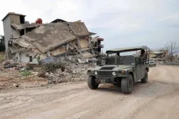 A Lebanese Army vehicle near a destroyed position in the town of Naqoura in South Lebanon (AFP)