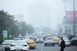 Cars drive through central Baghdad as a thick fog blankets the Iraqi capital on December 11, 2025. (AFP)