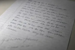 This photo illustration taken in Seoul on December 24, 2025 shows a copy of a letter written on October 28, 2025 by North Korean prisoners of war in Ukraine. (AFP)