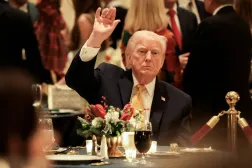 US President Donald Trump takes part in a Christmas Eve dinner in the ballroom of his Mar-a-Lago club in Palm Beach, Florida, US, December 24, 2025. REUTERS/Jessica Koscielniak