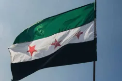 A Syrian flag waves in Damascus. (Getty Images/AFP)
