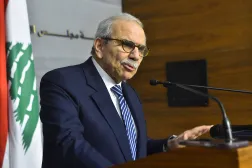 A photograph released by the Lebanese Government Press Office on December 26, 2025, show Prime Minister Nawaf Salam speaking during a press conference after a cabinet session in Beirut on December 26, 2025. (Photo by Handout / Lebanese Government Press Office / AFP)