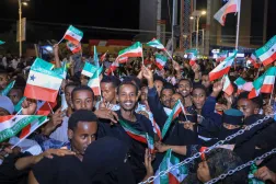 Residents wave Somaliland flags as they gather to celebrate Israel's announcement recognizing Somaliland's statehood in downtown Hargeisa, on December 26, 2025. (AFP)