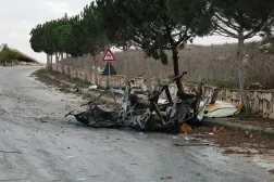 A photograph shows the wreckage of a vehicle targeted by an Israeli airstrike on the road linking the southern Lebanese border village of Odeisseh to Markaba, on December 16, 2025. (AFP)