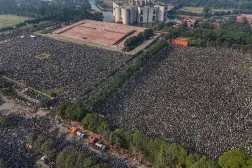An aerial view shows mourners gathered for the funeral ceremony of Bangladesh's former Prime Minister Khaleda Zia at the Parliament House premises in Dhaka on December 31, 2025 a day after her death. (AFP)