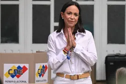 Venezuelan opposition leader Maria Corina Machado gestures as she votes during the presidential election, in Caracas on July 28, 2024. (AFP)