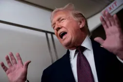 US President Donald Trump speaks with members of the media aboard Air Force One en route from Florida to Joint Base Andrews, Maryland, US, January 11, 2026. REUTERS/Nathan Howard