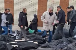 This video grab taken on January 14, 2026 from UGC images posted on social media on January 13, 2026, shows dozens of bodies lying on the ground at the Tehran Province Forensic Diagnostic and Laboratory Centre in Kahrizak, as grieving relatives search for their loved ones. (UGC / AFP) 