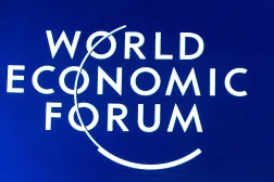 FILED - 23 January 2020, Switzerland, Davos: The World Economic Forum logo is displayed on a board during a plenary session. Photo: Ciaran McCrickard/World Economic Forum/dpa 