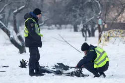 Police officers inspect remains of a Russian suicide drone, amid Russia's attack on Ukraine, in Kyiv, Ukraine, January 20, 2026. (Reuters)