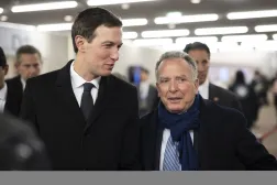 Jared Kushner (L), American businessman and Steve Witkoff (R), United States Special Envoy to the Middle East and special envoy for peace missions walk in the corridors during the 56th annual meeting of the World Economic Forum (WEF) in Davos, Switzerland, 20 January 2026. (EPA)