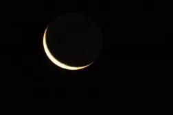 A waning crescent moon shines in the sky over Sanaa, Yemen, 15 February 2026, ahead of the holy fasting month of Ramadan. (EPA)