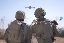 Two Israeli soldiers launch a drone. (Israeli Army)
