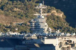 US aircraft carrier USS Gerald Ford is pictured docked at Souda Bay in the Greek Mediterranean island of Crete, on February 24, 2026. (AFP)