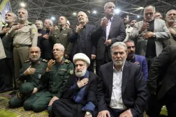 Ziyad al-Nakhalah, head of the Palestinian Islamic Jihad movement (seated right), alongside Naim Qassem, secretary-general of Lebanon’s Hezbollah, and senior Iranian military officials during the funeral of late Hamas leader Ismail Haniyeh in Tehran, August 2024 (Reuters)