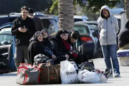 Displaced residents from the southern suburbs sit along Corniche Al Manara in Beirut, Lebanon, 02 March 2026, after fleeing their homes following Israeli strikes. EPA/WAEL HAMZEH