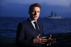  French President Emmanuel Macron speaks to members of the media as he visits the French aircraft carrier Charles de Gaulle, during his visit to Cyprus, Monday March 9, 2026. (Gonzalo Fuentes/Pool Photo via AP) 