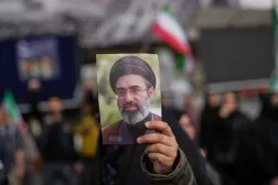  A demonstrator holds a picture of Iran's Supreme Leader Mojtaba Khamenei during a gathering after announcement of a two-week ceasefire with the United States and Israel, in Tehran, Iran, Wednesday, April 8, 2026. (AP) 