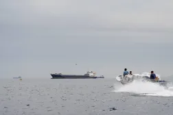 Ships and a boat in the Strait of Hormuz on April 12, 2026 (Reuters)