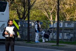 Police forensic officers inspect a scene near the Israeli consulate in Istanbul on April 7, 2026, following a shootout between gunmen and police. (Photo by Yasin AKGUL / AFP)
