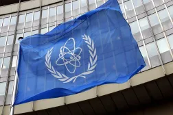 01 November 2004, Austria, Vienna: The flag of the International Atomic Energy Agency (IAEA) flies in front of the UN seat in Vienna. (dpa)