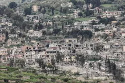 A photograph taken from the Israeli side of the border with Lebanon shows destroyed buildings in southern Lebanon on April 15, 2026.(Photo by Jack GUEZ / AFP) 