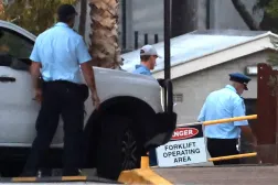 Australian SAS soldier Ben Roberts-Smith (C) is escorted from the Silverwater Correctional Complex after being released on bail in Sydney on April 17, 2026. (Photo by DAVID GRAY / AFP)