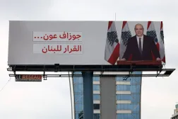 A billboard depicting Lebanese President Joseph Aoun and sentence reading in Arabic "The decision is up to Lebanon" is seen in the predominantly Christian Ashrafieh neighborhood in Beirut, Lebanon, 01 May 2026. (EPA)