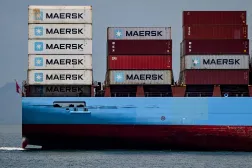 A cargo ship carrying containers from the Danish company Maersk sails into the Pacific entrance of the Panama Canal in Panama City on April 21, 2026. (Photo by MARTIN BERNETTI / AFP)