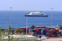 FILE PHOTO: Cruise ship MV Hondius docks off Cape Verde port, as passengers were not allowed off the ship, while health authorities investigated suspected cases of hantavirus aboard the vessel, in Praia Port, Cape Verde, May 4, 2026. Picture taken with a mobile phone. REUTERS/Stringer/File Photo