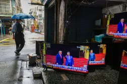 A pedestrian walks past a secondhand and TV repair store, with TV screens broadcasting the Beijing meeting between US President Donald Trump and Chinese President Xi Jinping, in Taipei, Taiwan, 14 May 2026. (EPA)