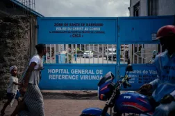 A motorcycle taxi driver waits for clients in front of the entrance of CBCA Virunga General Hospital, in Goma on May 17, 2026. (AFP)