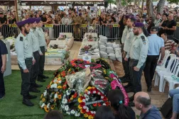 People react while attending the funeral of an Israeli soldier Captain Doctor Ori Yosef Silvester, a 30-year-old army doctor for the Givati Brigade's Shaked Battalion, who was killed in southern Lebanon, at the Segula Cemetery in Petah Tikva on June 2, 2026. (AFP)