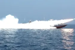 This handout photo released by Iran’s Revolutionary Guards Corps (IRGC)’s official website Sepanews on February 17, 2026, shows a rocket being fired from a boat during a military exercise by members of the IRGC and navy in the Strait of Hormuz via AFP