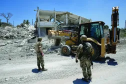 Lebanese army remove the rubble of a house that was destroyed in the recent clashes between Hezbollah fighters and Israeli troops in Dibbine village, southeast Lebanon, Friday, June 5, 2026, a day after Israeli forces withdrew. (AP Photo/Hussein Malla)