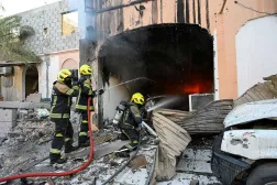 Firefighters work to extinguish fire in the aftermath of Iranian drone attacks, according to Bahrain's Interior Ministry, at a location given as Bahrain, in this handout image released on June 11, 2026. Ministry of Interior of the Kingdom of Bahrain/Handout via REUTERS