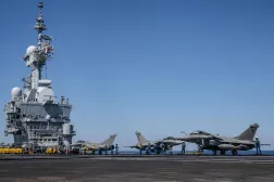 (FILES) This photograph taken on April 27, 2026, shows Rafale fighter aircraft parked on the flight deck of the French aircraft carrier Charles de Gaulle during the NATO military exercise Neptune Strike 26-2, off the coast of the Greek island of Crete. (Photo by Angelos TZORTZINIS / AFP)
