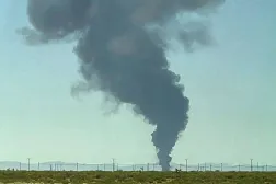 Smoke plumes rise from a B-52 bomber that crashed shortly after takeoff at a US Air Force base in Southern California, Monday, June 15, 2026. (Debbie Reyes Katz via AP Photo)