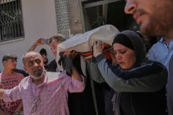 Mourners carry the body of Palestinian Raghad Hassan Ashour, 16, during her funeral at Al-Shifa Hospital after she was killed in an Israeli airstrike, in Gaza City, Monday June 22, 2026. (AP Photo/Jehad Alshrafi)